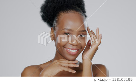 Face, skincare and hands of happy black woman in studio isolated on a gray background for aesthetic. Portrait, touch and natural beauty cosmetics of model in spa facial treatment, wellness and health Face, skincare and hands of happy black woman in studio isolated on a gray background for aesthetic. Portrait, touch and natural beauty cosmetics of model in spa facial treatment, wellness and health 138103199