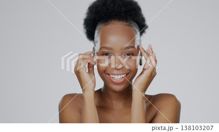 Face, skincare and hands of happy black woman in studio isolated on gray background for dermatology. Portrait, touch and natural beauty cosmetics of model in spa facial treatment, wellness or health 138103207