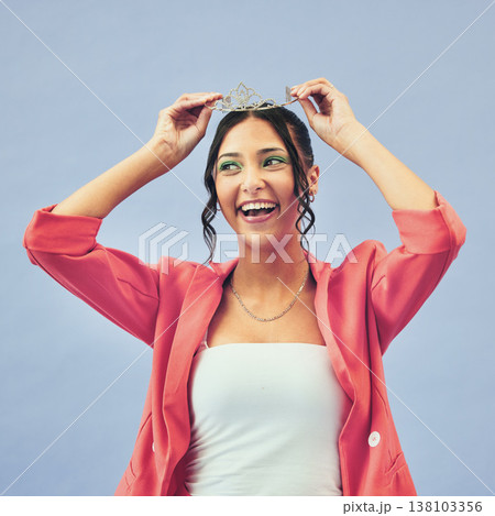 Fashion, beauty and woman with tiara in studio for glamour, luxury and winning prize. Excited, wow and isolated person with crown for princess winner, pageant and cosmetics on purple background 138103356