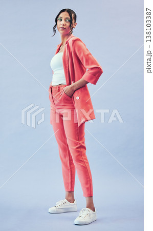 Thinking, fashion and woman with makeup, questions and ideas on a blue studio background. Person, girl and model with stylish clothes, cosmetics and trendy outfit with gen z, fantasy and mockup space 138103387