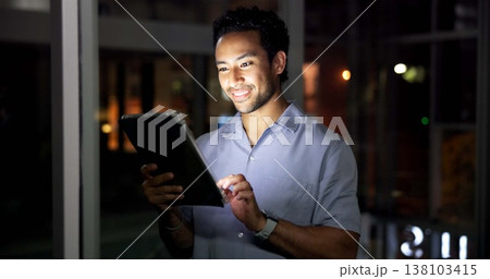 Night, man and research in office with tablet, journalist investigation or news publication deadline. Late, person and writer in workplace with tech, browsing or check website for article submission. Night, man and research in office with tablet, journalist investigation or news publication deadline. Late, person and writer in workplace with tech, browsing or check website for article submission. 138103415