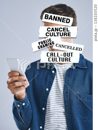 Cancel culture, overlay and phone with text on person for social media, cyber bullying and toxic message. Free speech, censorship and anger with man on white background for warning, online and voice Cancel culture, overlay and phone with text on person for social media, cyber bullying and toxic message. Free speech, censorship and anger with man on white background for warning, online and voice 138103520