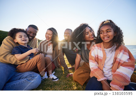 Parents, grandparents and children on grass outdoor laughing together on funny vacation in summer. Interracial family on beach for holiday picnic with smile of men, women and kids for generation love Parents, grandparents and children on grass outdoor laughing together on funny vacation in summer. Interracial family on beach for holiday picnic with smile of men, women and kids for generation love 138103595