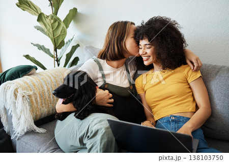 Dog, laptop or gay couple kiss on sofa to relax together in healthy relationship love connection. Whisper, home or happy lesbian women with a pet animal to bond on living room couch for remote work Dog, laptop or gay couple kiss on sofa to relax together in healthy relationship love connection. Whisper, home or happy lesbian women with a pet animal to bond on living room couch for remote work 138103750