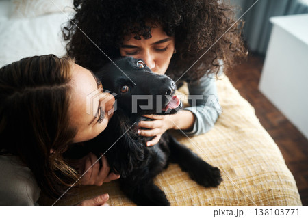Love, women and dog with kiss on bed in bedroom of family home for fur puppy, pet and happiness indoor. Labrador, animal and people together in room with cuddling and care for bonding and loyalty 138103771