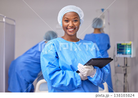 Smile, portrait and a black woman in surgery with a tablet for information, research and a schedule. Happy, hospital and an African surgeon or nurse with technology in a theater for communication Smile, portrait and a black woman in surgery with a tablet for information, research and a schedule. Happy, hospital and an African surgeon or nurse with technology in a theater for communication 138103824