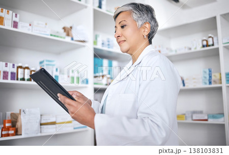 Tablet, medicine pharmacist and woman research, search or reading online product description, drugs or medical stock. Clinic, mature pharmacy worker or check supplement, healthcare data or pills info 138103831
