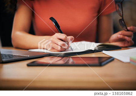 Notebook, office and hands of person writing summary notes, schedule or event planner working on appointment calendar. Project, closeup secretary and receptionist planning agenda, journal or report Notebook, office and hands of person writing summary notes, schedule or event planner working on appointment calendar. Project, closeup secretary and receptionist planning agenda, journal or report 138103862