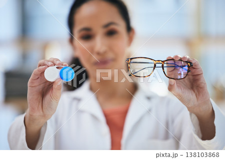 Hands, glasses and contact lens, woman with choice of eye care and help with optometry, vision and healthcare closeup. Doctor, frame and lenses container with decision, advice and ophthalmologist 138103868