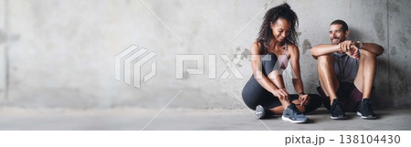 Couple, fitness and happy by banner on break, active and health or wellness. Positive people, smile and exercise by training, gym and space on gray background, performance and cardio workout at wall Couple, fitness and happy by banner on break, active and health or wellness. Positive people, smile and exercise by training, gym and space on gray background, performance and cardio workout at wall 138104430