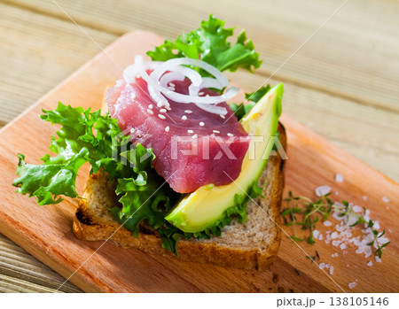 Toast with tuna and avocado Toast with tuna and avocado 138105146