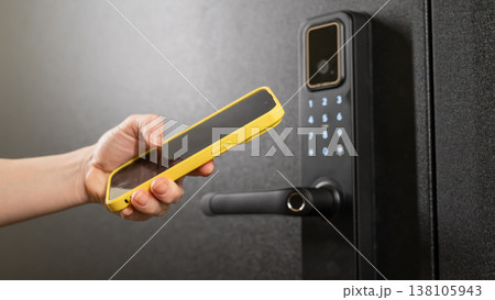 Modern smart door lock with digital keypad and keyless entry via smartphone. Modern smart door lock with digital keypad and keyless entry via smartphone. 138105943