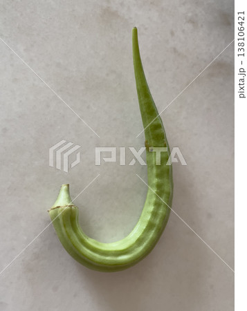 Deformed J Shape Okra Abelmoschus Esculentus On White Background 138106421