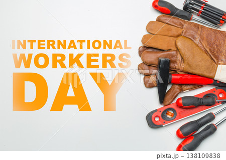 Celebration of International Workers Day on May 1 with tools and gloves on a plain background Celebration of International Workers Day on May 1 with tools and gloves on a plain background 138109838