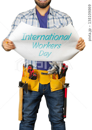 Workers hold sign for International Workers Day event on May 1 138109869
