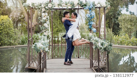 Couple, wedding and dance with spin in celebration of ceremony with gratitude, smile or support. Happy partnership, laugh or marriage in romance with excited for beauty, dress or commitment in garden Couple, wedding and dance with spin in celebration of ceremony with gratitude, smile or support. Happy partnership, laugh or marriage in romance with excited for beauty, dress or commitment in garden 138112977