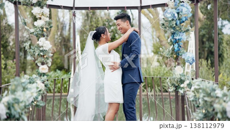 Couple, wedding and dance with laugh or connection, commitment or gratitude to bride for romance. Happy partnership, support or marriage for together or excited in dress, ceremony or union in garden 138112979