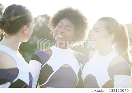 Cheerleader, sports and women on field smile for performance, dance and motivation for game. Teamwork, dancer and people in costume cheer for support in match, competition and sport event outdoors Cheerleader, sports and women on field smile for performance, dance and motivation for game. Teamwork, dancer and people in costume cheer for support in match, competition and sport event outdoors 138113079