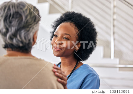 Old woman, nurse and care with conversation, support and happiness with healthcare, smile and treatment. Comfort, African person and medical professional with senior patient, trust and caregiver Old woman, nurse and care with conversation, support and happiness with healthcare, smile and treatment. Comfort, African person and medical professional with senior patient, trust and caregiver 138113091