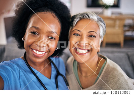 Selfie, smile and assisted living caregiver with an old woman in the living room of a home together. Portrait, support or community with a happy nurse or volunteer and senior patient in a house 138113093