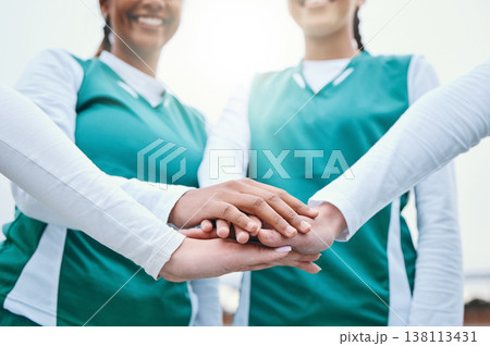 Hands, sports women or team in huddle with support, smile or plan for a hockey training game. Low angle, stack or happy female athletes in practice for exercise or match together with pride or unity 138113431