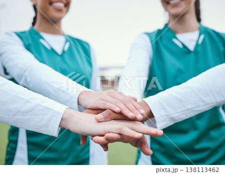 Hands, sports group or team in huddle with support, smile or plan for a hockey training game. Women, stack or happy female athletes in practice for exercise or match together with pride or teamwork 138113462