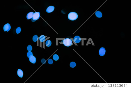 Blue, confetti and bokeh in a studio with dark background for celebration, event or party. Lights, glitter and color sparkles for magic, shine or glow for festive by black backdrop with mockup. Blue, confetti and bokeh in a studio with dark background for celebration, event or party. Lights, glitter and color sparkles for magic, shine or glow for festive by black backdrop with mockup. 138113654