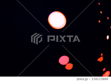 Bokeh, red color lights and black background with pattern, texture and dots on mockup with cosmic aesthetic. Night lighting, sparkle particles and glow on dark wallpaper with space, shine and flare. Bokeh, red color lights and black background with pattern, texture and dots on mockup with cosmic aesthetic. Night lighting, sparkle particles and glow on dark wallpaper with space, shine and flare. 138113660