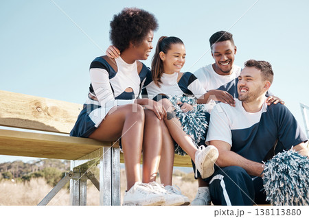 Cheerleader, sports and team on bench talking for performance, dance and motivation for game. Teamwork, dancer and people relax in costume for support in match, competition and field event outdoors Cheerleader, sports and team on bench talking for performance, dance and motivation for game. Teamwork, dancer and people relax in costume for support in match, competition and field event outdoors 138113880