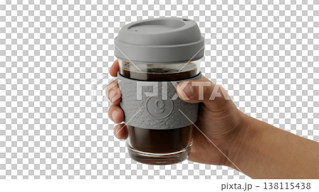 Hand holding an eco-friendly reusable glass coffee cup with a grey silicone lid and insulating sleeve, perfect for zero-waste lifestyle themes Hand holding an eco-friendly reusable glass coffee cup with a grey silicone lid and insulating sleeve, perfect for zero-waste lifestyle themes 138115438