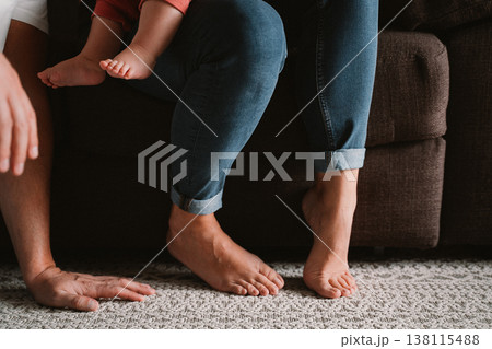 Family Bonding with Child on Sofa Relaxing Together Family Bonding with Child on Sofa Relaxing Together 138115488