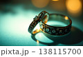 Elegant duo of jewelry rings in airy soft light. Minimal luxury and timeless aesthetic. 138115700