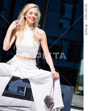 Woman wearing crop top and culottes 138116158