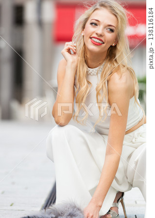 Woman wearing crop top and culottes Woman wearing crop top and culottes 138116184