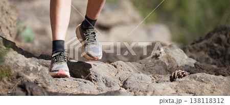 Walking or running exercise legs on rocky footpath in bright forest achievement fitness adventure and exercising in spring or summer nature motivation and inspirational activity Walking or running exercise legs on rocky footpath in bright forest achievement fitness adventure and exercising in spring or summer nature motivation and inspirational activity 138118312