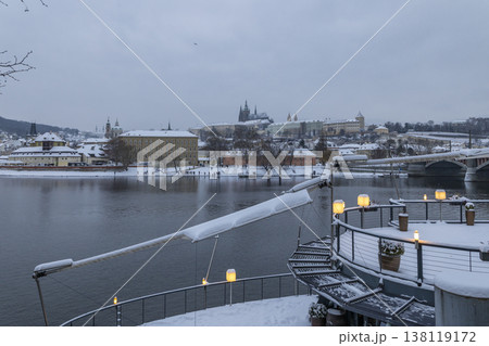 Prague Castle and Vltava river in snowy winter 138119172
