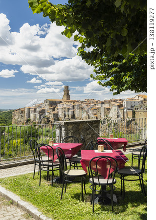 Outdoor cafe chairs overlooking Pitigliano town in Tuscany Outdoor cafe chairs overlooking Pitigliano town in Tuscany 138119277