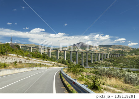 Highway viaduct extending across valley in Agnone, Italy Highway viaduct extending across valley in Agnone, Italy 138119291