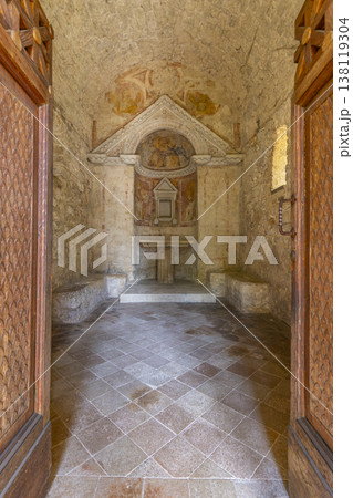 Clitunno Tempietto chapel interior with ancient frescoes 138119304