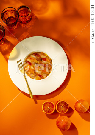Refreshing ceviche with blood orange on orange background Refreshing ceviche with blood orange on orange background 138119331