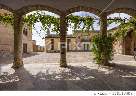Stone arches framing historic Tordesillas town square Stone arches framing historic Tordesillas town square 138119408