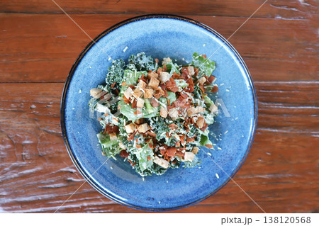 caesar salad or vegetable salad with bacon and crouton 138120568