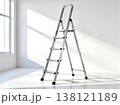 Modern silver aluminum stepladder in empty sunlit room with large window 138121189