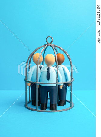 Businessmen trapped in a cage represent pressure from taxes and regulation. Bureaucracy limits growth. Economic barriers, compliance challenges, and poor investment climate affect business freedom 138121384