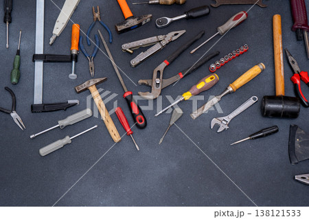 Various Hand Tools Background. Professional DIY Equipment for household. Assorted work and home renovation tool flat lay Various Hand Tools Background. Professional DIY Equipment for household. Assorted work and home renovation tool flat lay 138121533