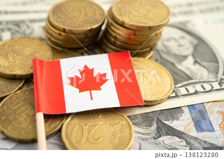 Canada flag on coin and banknote money, finance trading investment business currency. Canada flag on coin and banknote money, finance trading investment business currency. 138123280