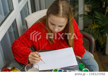 Hobby. Kid drawing. Cute child at home Hobby. Kid drawing. Cute child at home 138123392
