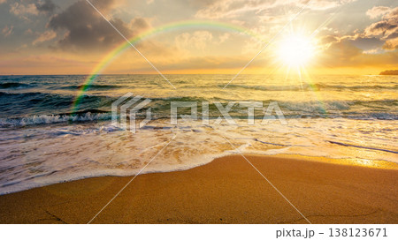 sunset over sandy sea beach background in autumn. low angle view. empty seascape scenery with calm waves. beauty seashore wallpaper. peaceful bay photo for advertising. weather with rainbow sunset over sandy sea beach background in autumn. low angle view. empty seascape scenery with calm waves. beauty seashore wallpaper. peaceful bay photo for advertising. weather with rainbow 138123671
