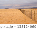 fence in desert 138124060