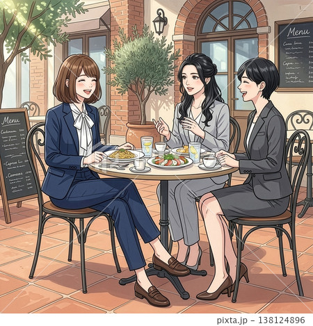 同僚とランチするビジネススーツの若い女性 同僚とランチするビジネススーツの若い女性 138124896